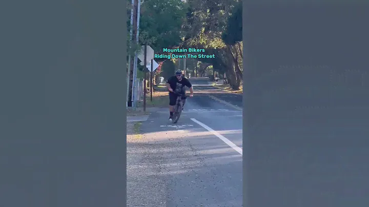 Normal People vs Mountain Bikers Riding Down The Street